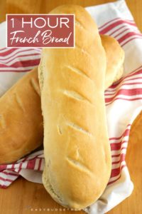Finished loaves of bread with text overlay for Pinterest.