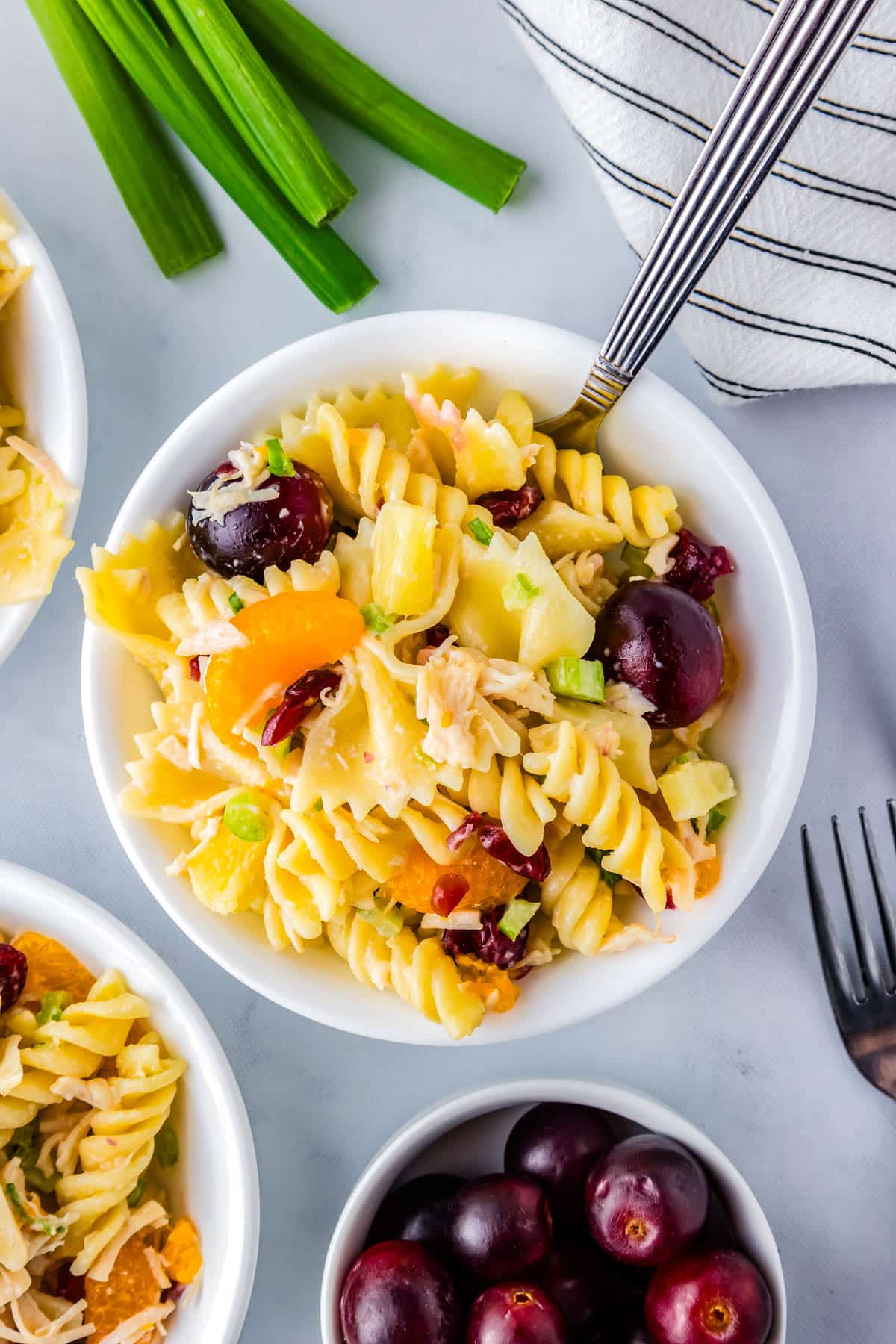 The finished chicken pasta salad recipe in a white bowl.