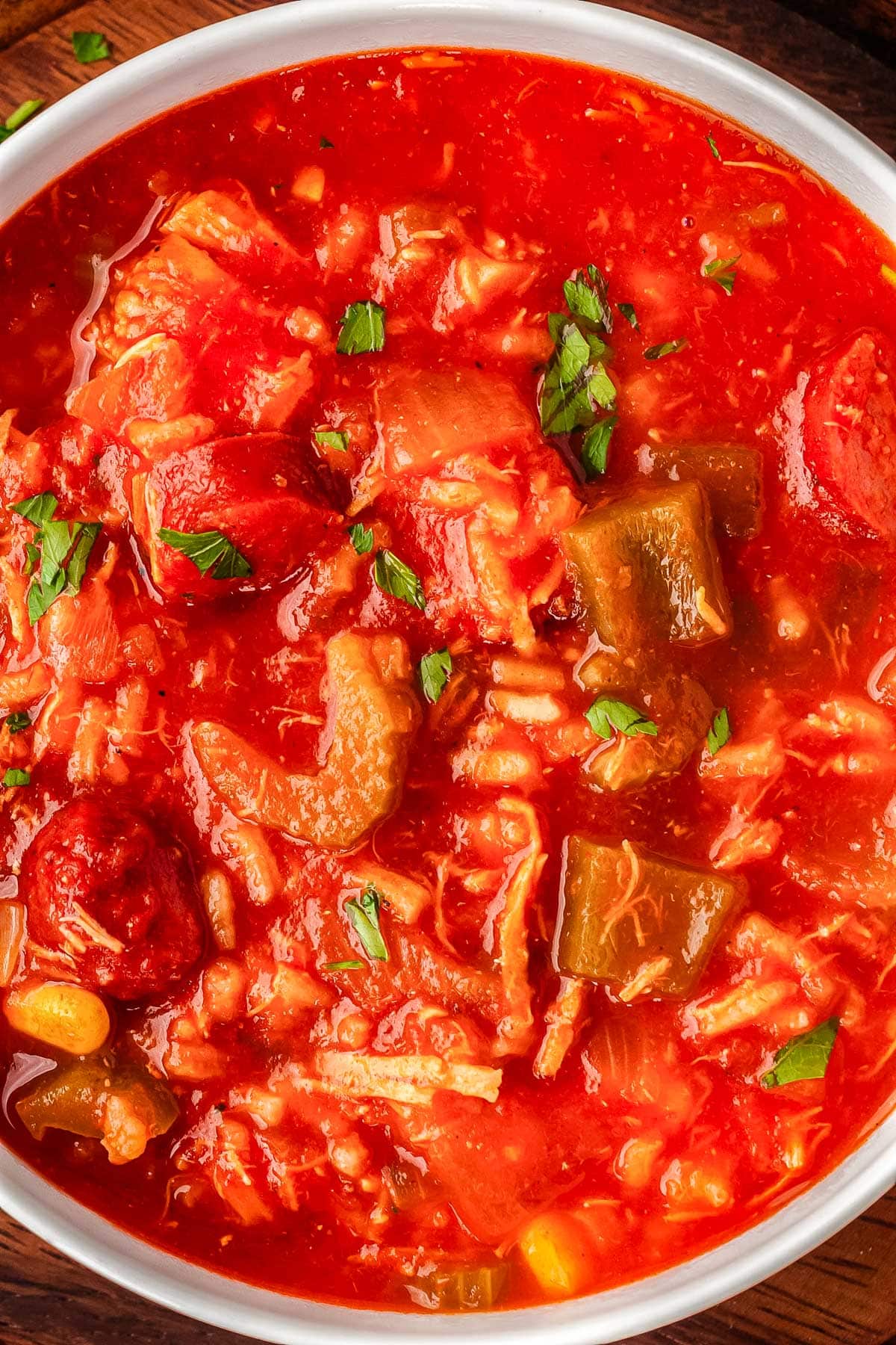 A close up of a pot of the finished easy gumbo so you can see the textures of the meat and vegetables.