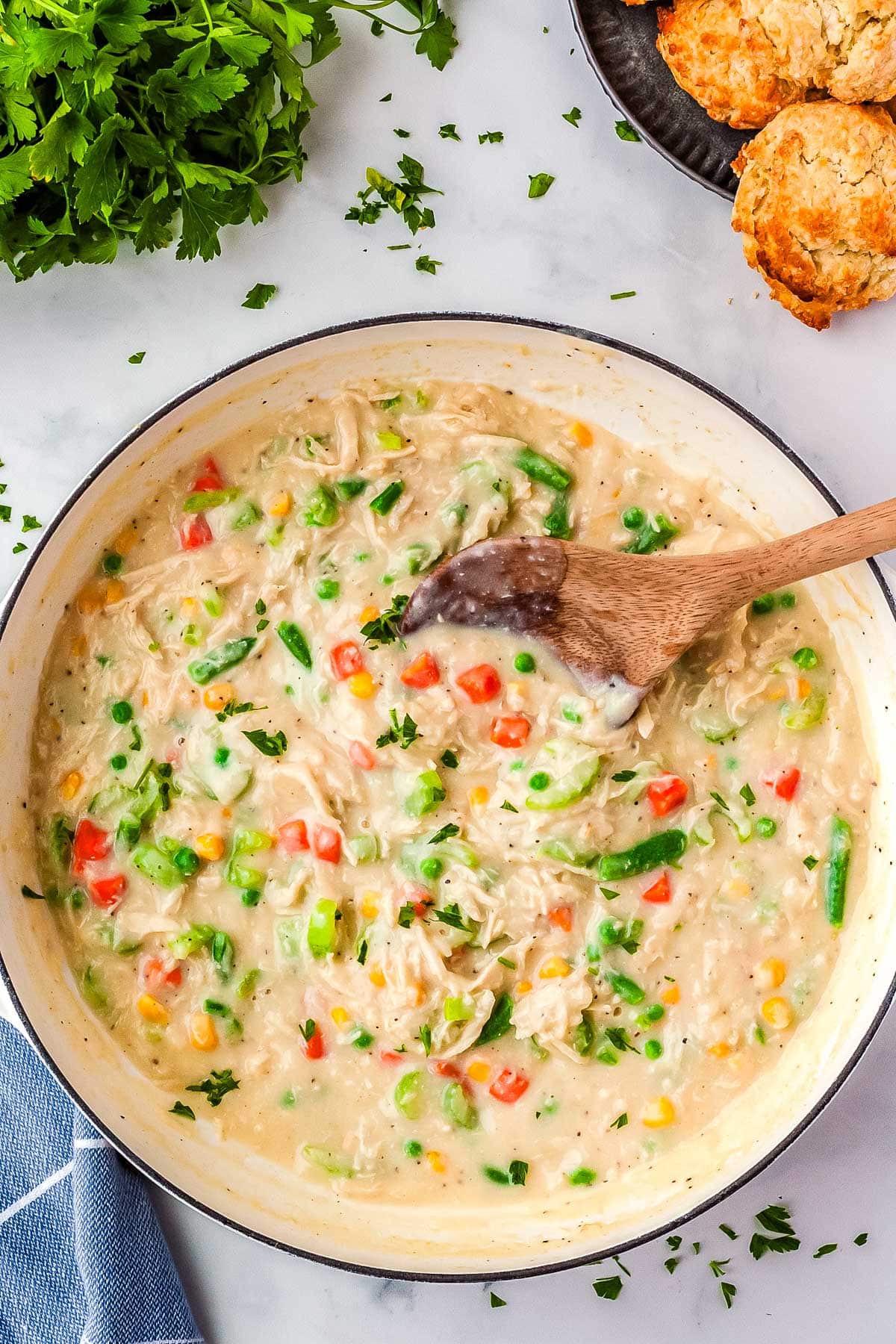 The deconstructed pot pie mixture in a white pan.