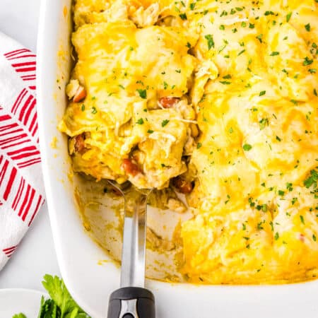 The finished casserole in a white pyrex dish.