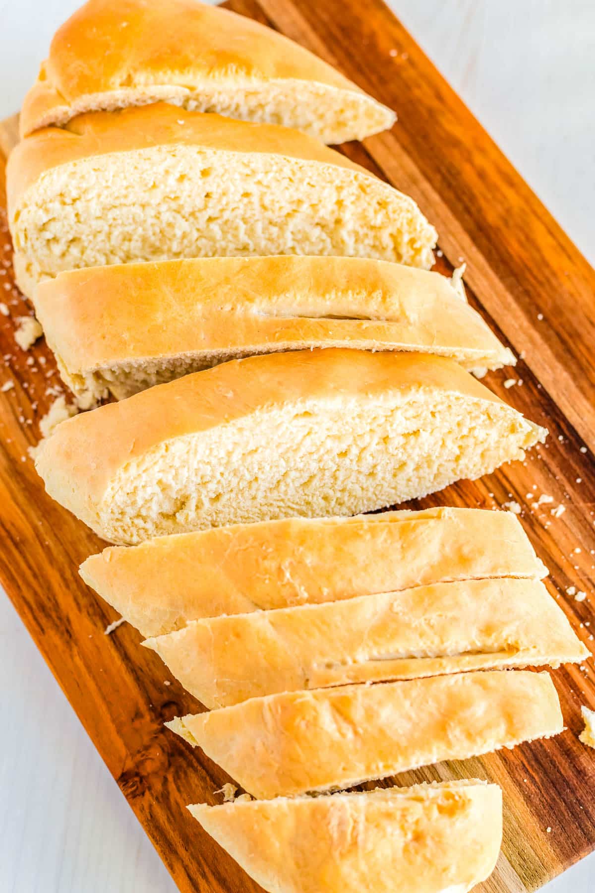 A loaf of French bread cut into slices.
