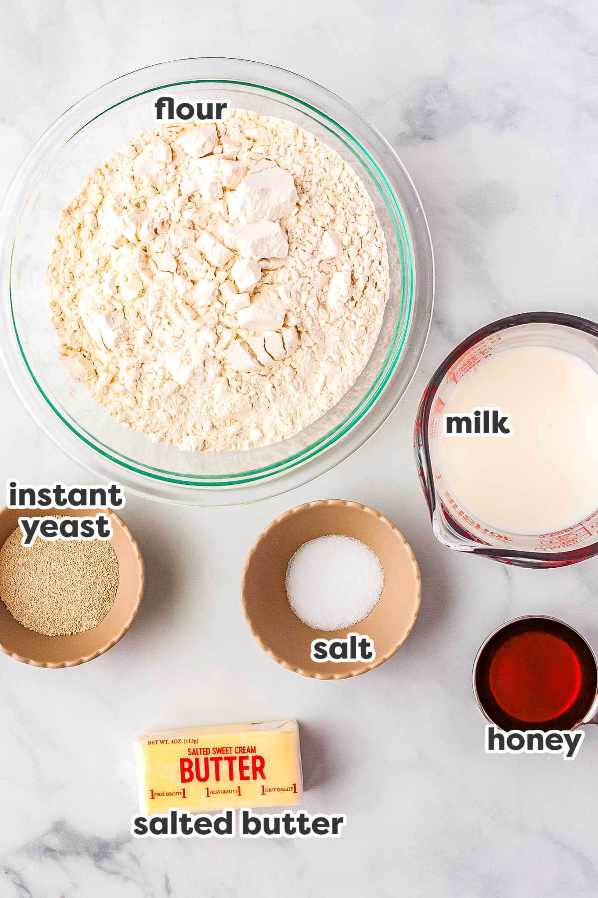 All ingredients needed to make this recipe with text overlay labeling each ingredient. 