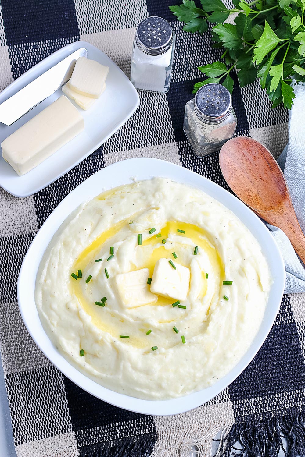 An overhead picture of creamy mashed potatoes made with cream cheese.