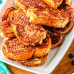 french toast stacked on a serving platter