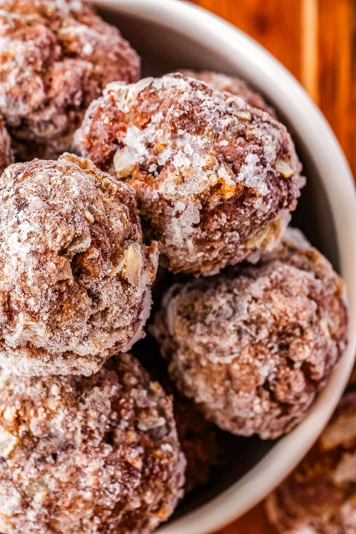 A close up of frozen meatballs.