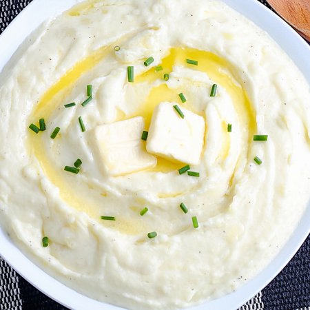 A close up overhead picture of mashed potato recipe with cream cheese.