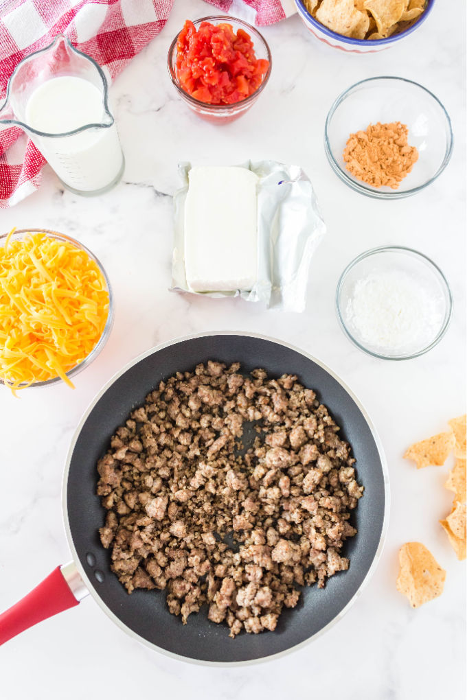 An overhead picture of all the ingredients needed to make this ROTEL Sausage Dip recipe.