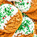 a plate of gingerbread cookies dipped in chocolate