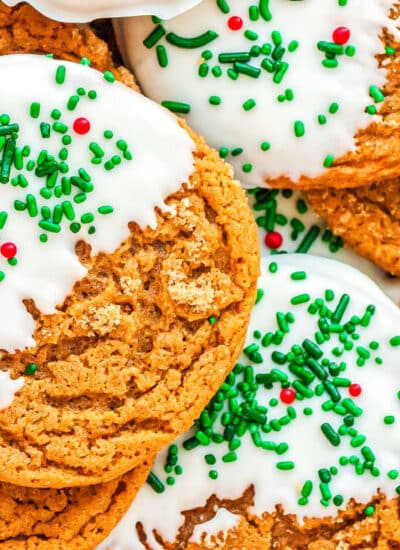 a plate of gingerbread cookies dipped in chocolate