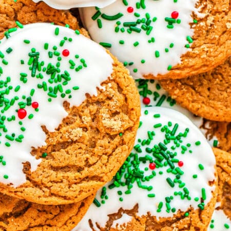 a plate of gingerbread cookies dipped in chocolate