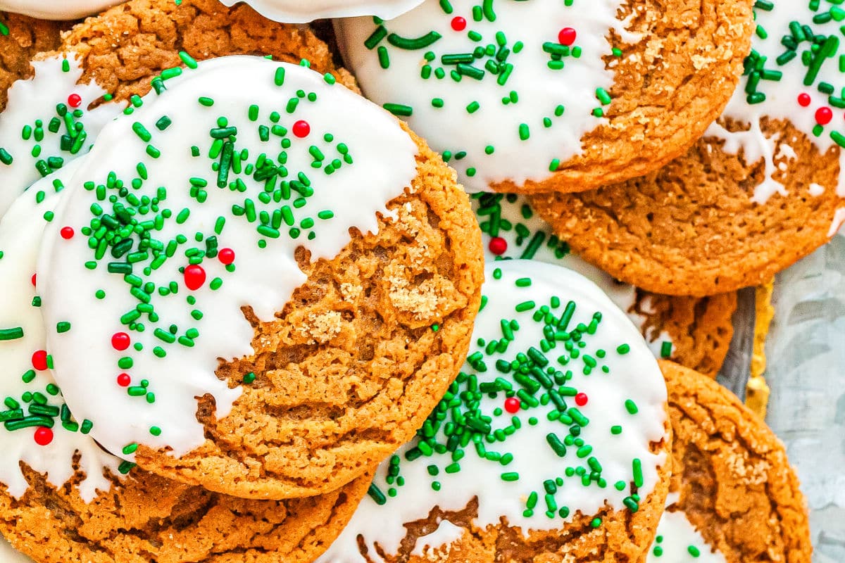 a plate of gingerbread cookies dipped in chocolate