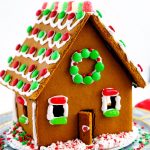 Large gingerbread house decorated with royal icing and candy.