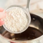 Whisk the flour into the reserved beef pan drippings.