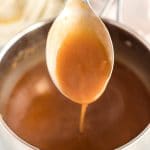Keep whisking and cooking until the gravy thickens.