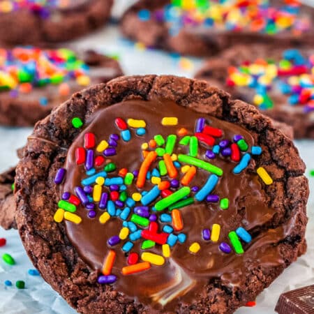 brownie cookie with sprinkles with more cookies in the background