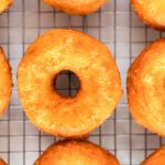 Take the donuts out of the oil and place them on a wire rack.