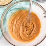 Whisk together peanut butter and butter.
