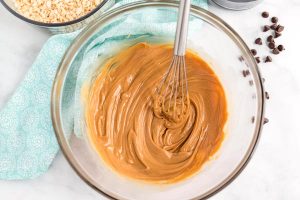 Whisk together peanut butter and butter.