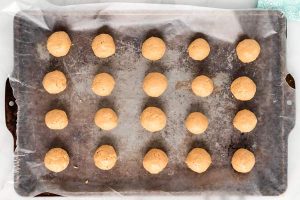 Freeze the peanut butter bon bons until solid before dipping in chocolate.