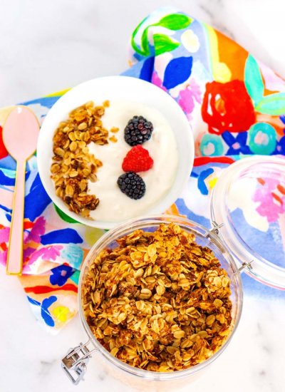 Overhead picture of granola and a bowl of yogurt.