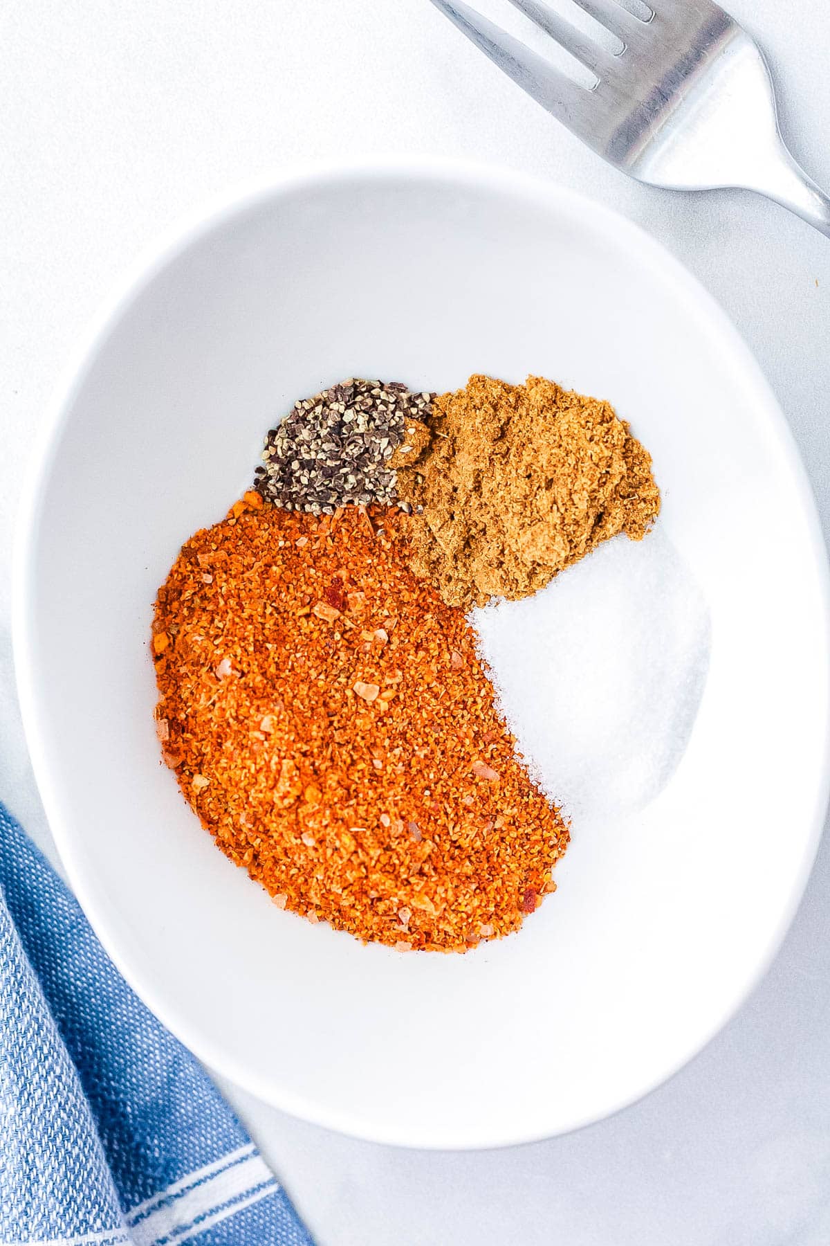 The seasoning in a white bowl.