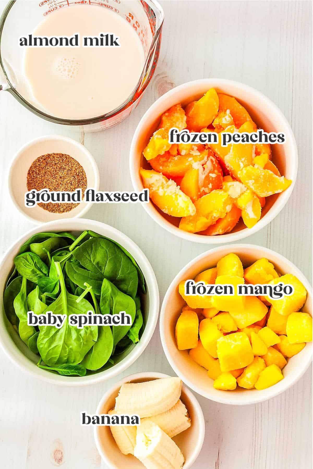 ingredients for making mango smoothie with text overlay