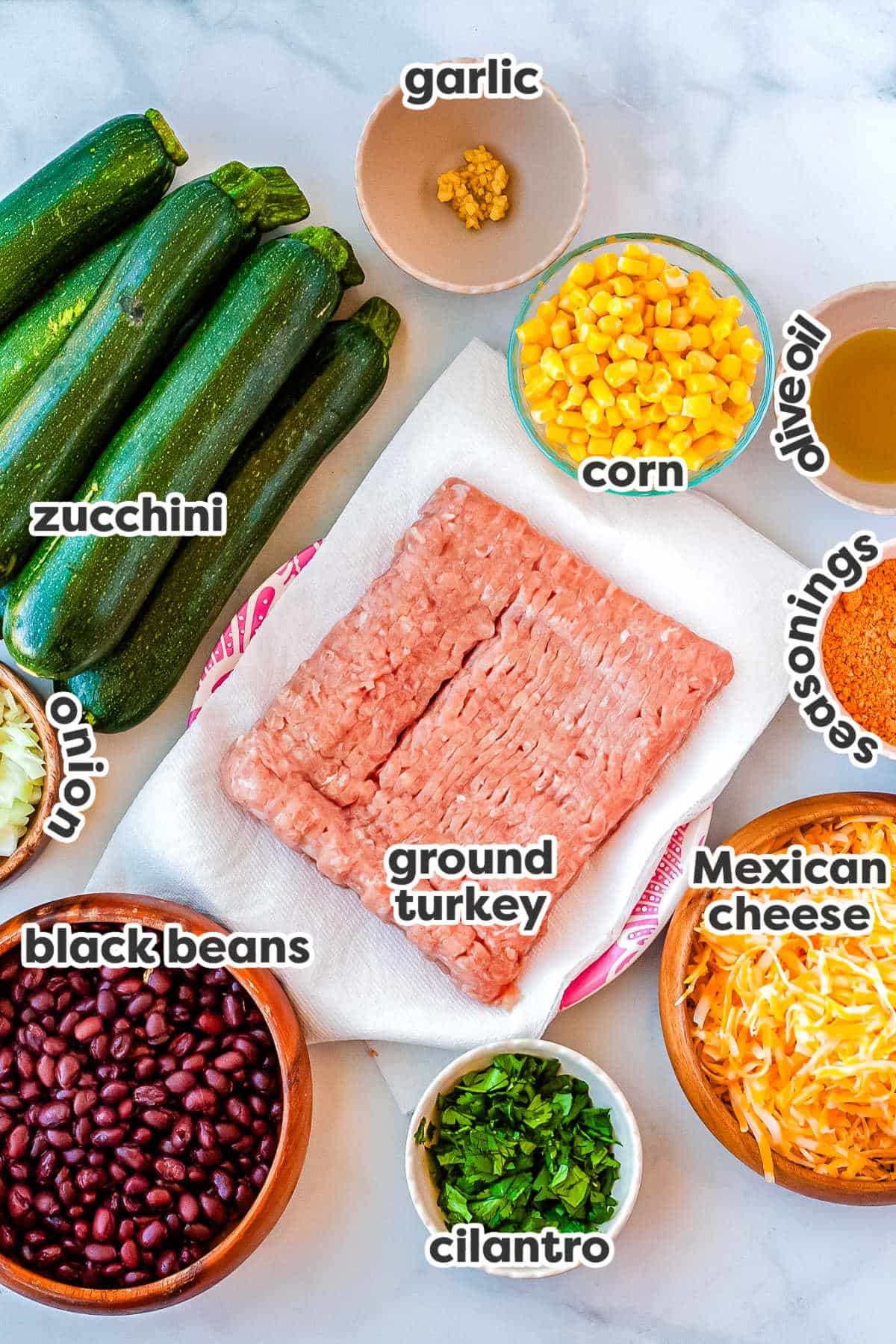 All of the ingredients needed to make this recipe with text overlay labeling each ingredient.