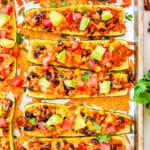 The finished Zucchini Taco Boats on a rimmer baking sheet.