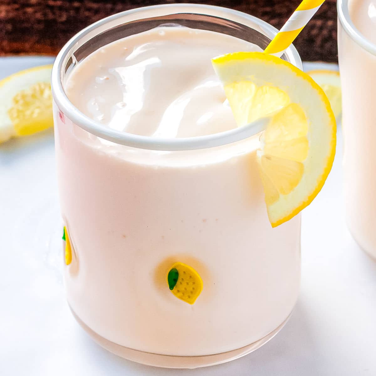 The frosted lemonade poured into a glass.