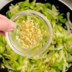 Add the garlic and stir constantly until the garlic is fragrant, about 30 seconds.