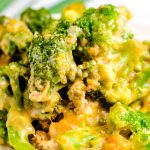 A close up picture of cheesy broccoli casserole.