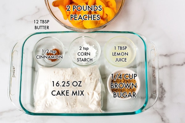 A picture of the ingredients needed to make this peach cobbler with text overlay. 