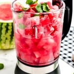 Add all of the ingredients to a blender.