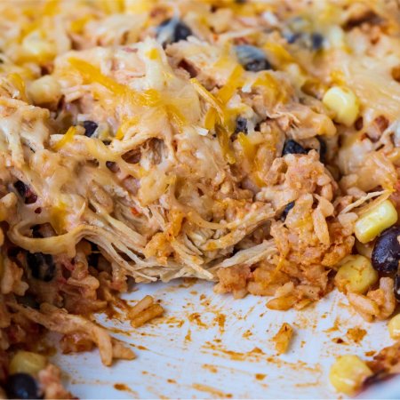 A close up of the taco rice casserole in the casserole dish.