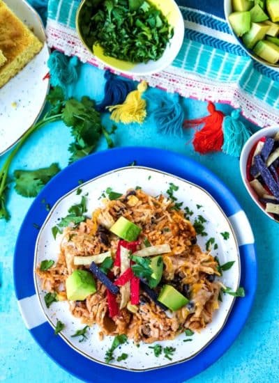 An overhead picture of taco rice casserole on a plate.
