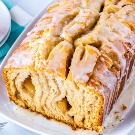 The bread with a slice cut from the end so you can see the interior.