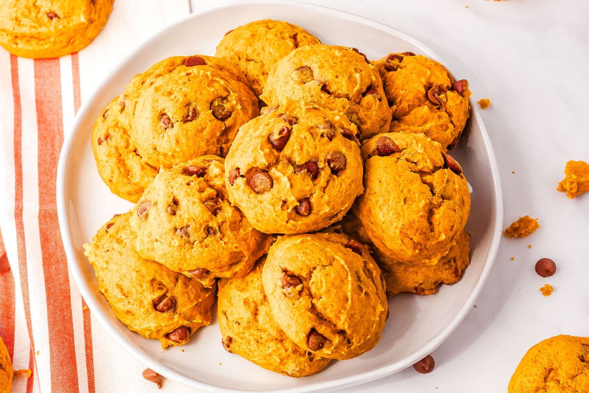 a plate full of pumpkin chocolate chip cookies