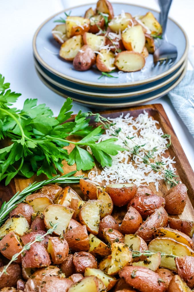 The oven roasted red potatoes on a dinner plate.