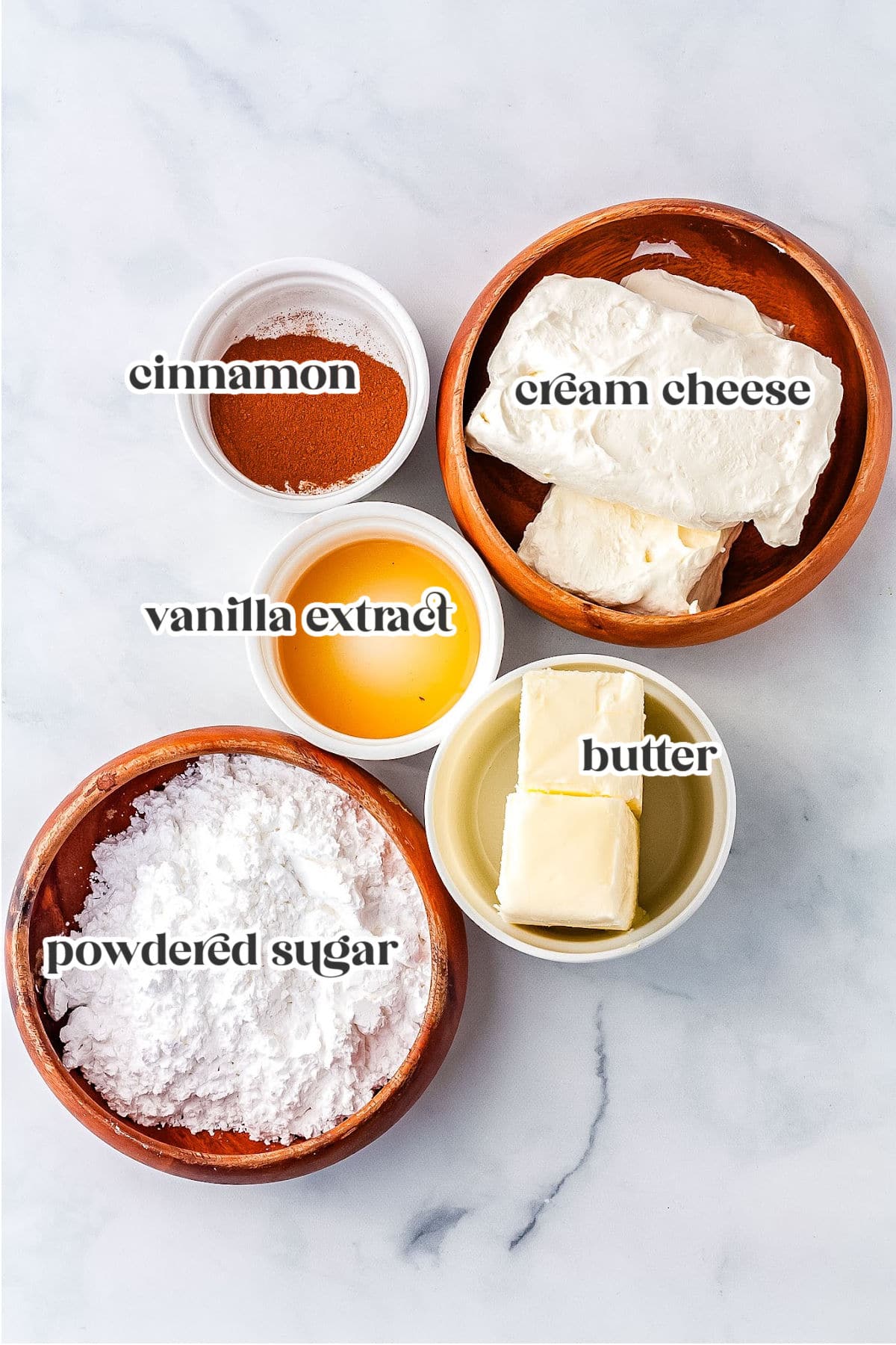 the ingredients for making cream cheese frosting with cinnamon