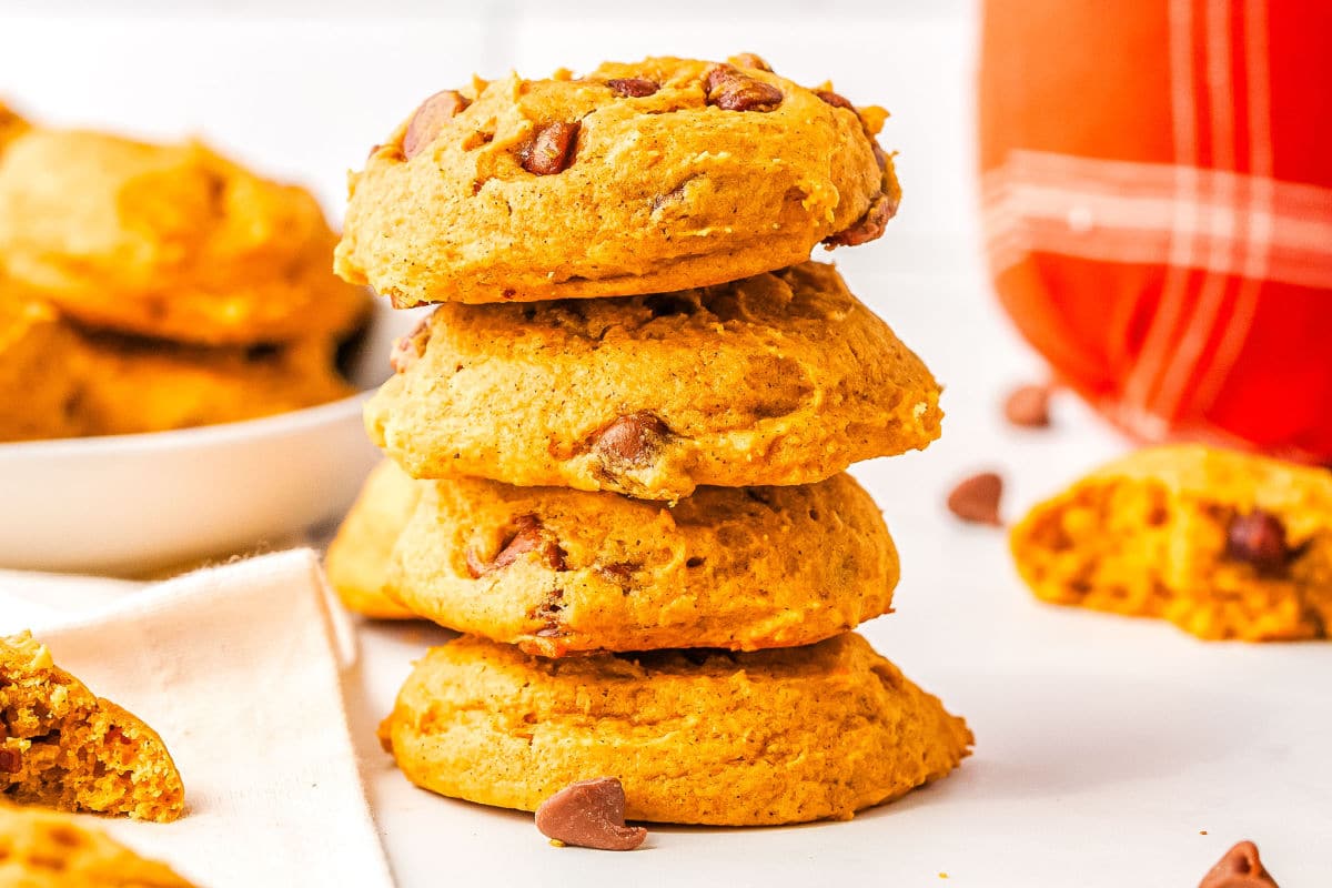 a stack of pumpkin chocolate chip cookies
