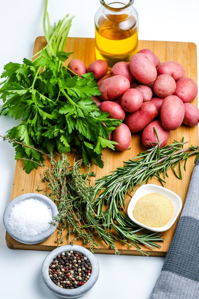 All of the ingredients needed to make oven roasted red potatoes.