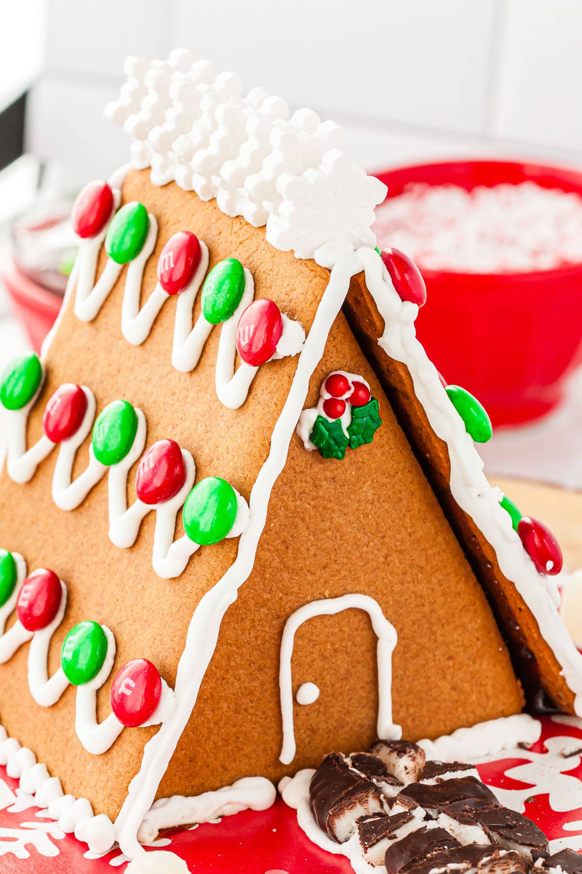 A decorated A Frame Gingerbread House that has been decorated.