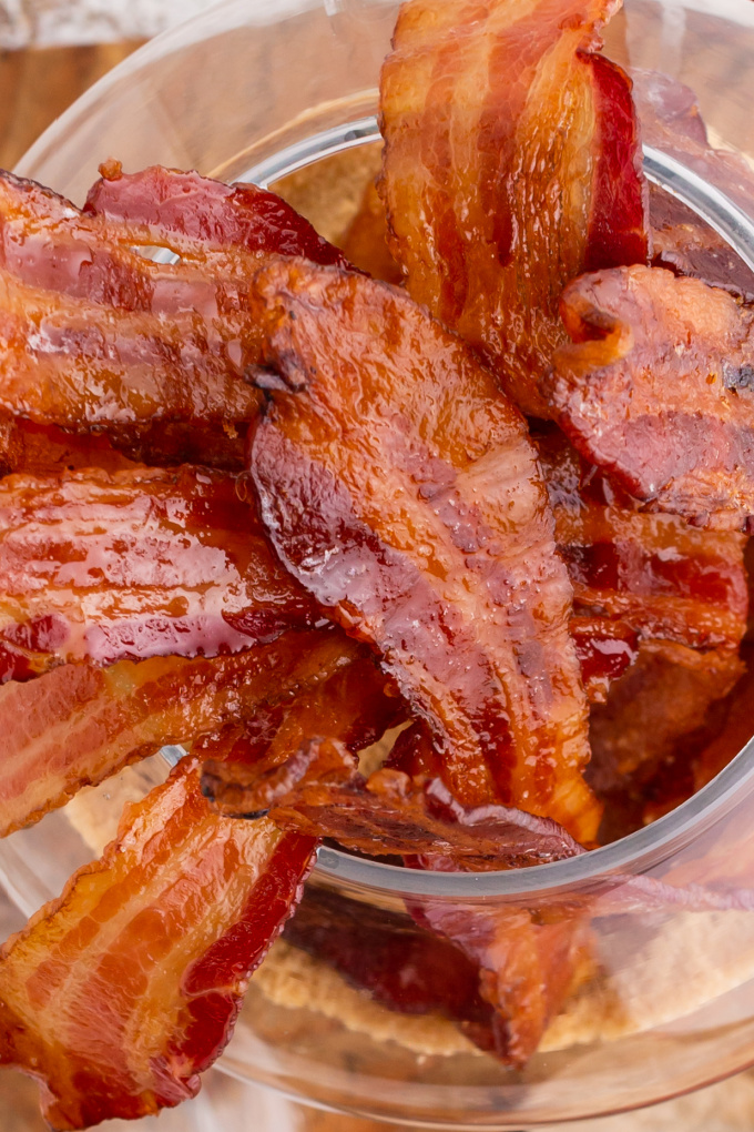 The candied bacon sticking straight up in a clear glass. 