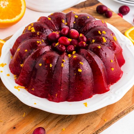 The finished Cranberry Jello Salad on a white serving plate.
