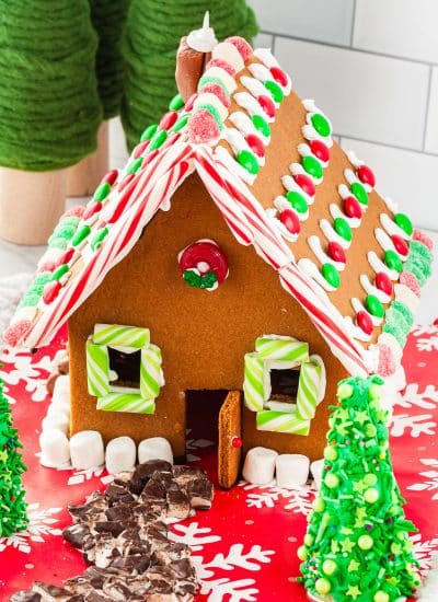 The finished gingerbread house recipe that has been decorated.