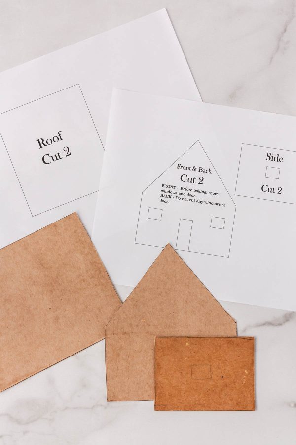 The gingerbread house templates on a countertop.