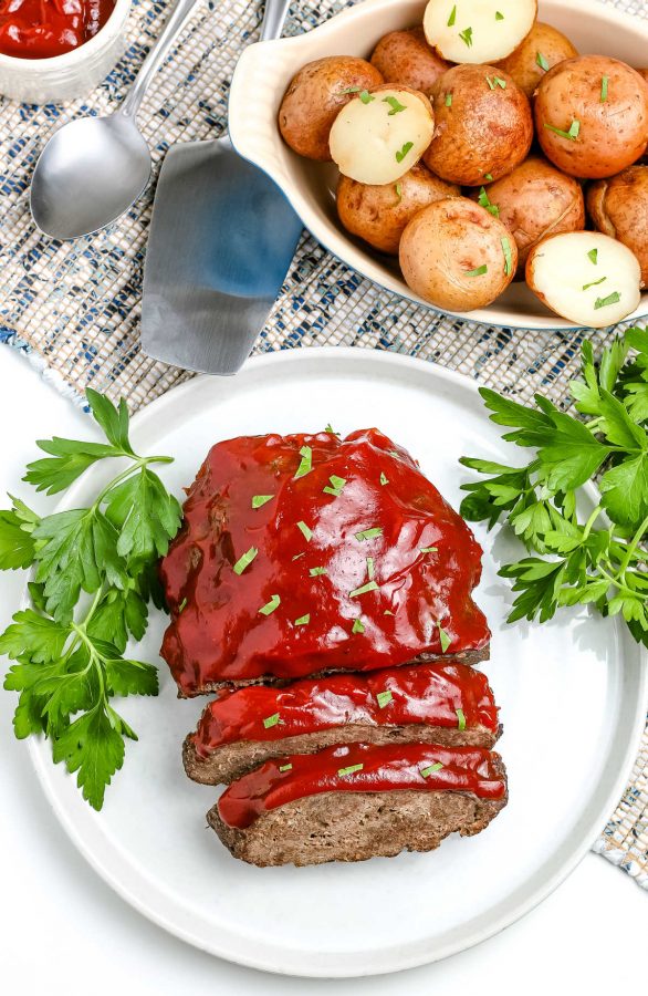 An overhead picture of the finished Instant Pot Meatloaf and Potatoes on a white platter.