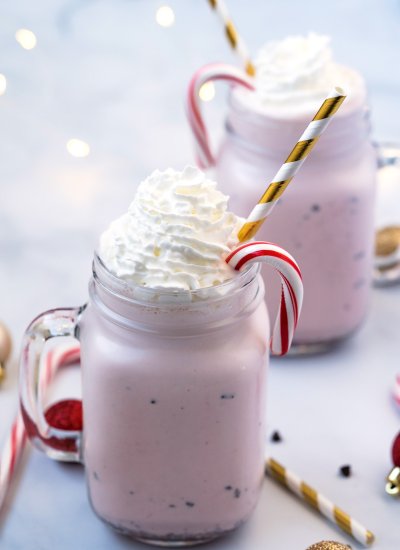 The finished Chick Fil A Peppermint Shake in a mug with a straw.