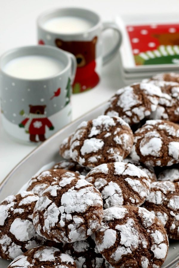 The finished chocolate crinkle cookie recipe on a white platter.